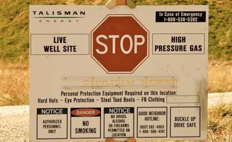 Mixed messages: a warning sign at a fracking site in Pennsylvania. Photo: Ostroff Law / Wikimedia Commons.