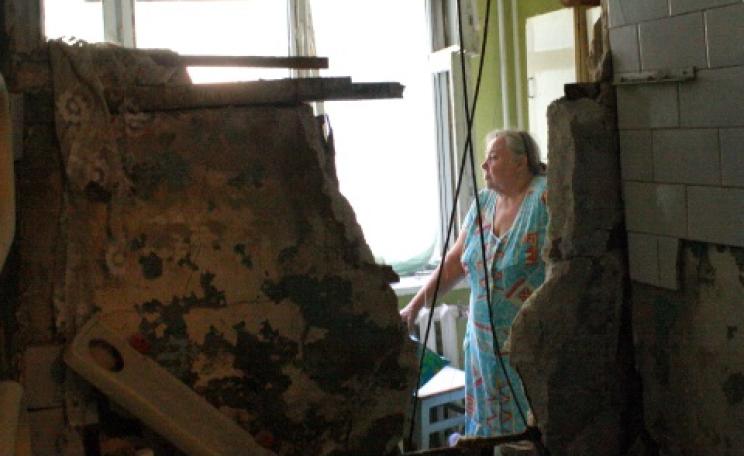 An unguided Grad rocket hit the house of Valentina Fedorovna, 77, in the Kuibyshivskyi district in Donetsk on July 19, 2014. The rocket struck the second floor, penetrated the floor and went through her kitchen and bathroom. Photo: Human Rights Watch.