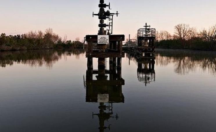 The whole region is carved up by canals with well heads like these at the ends. Photo: Paul Goyette via Flickr.