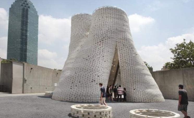 This handsome tower was built from bricks made with farm and forestry waste bound together by fungal myceliae. Now, it's being composted. Photo: Sophie Morlin-Yron.