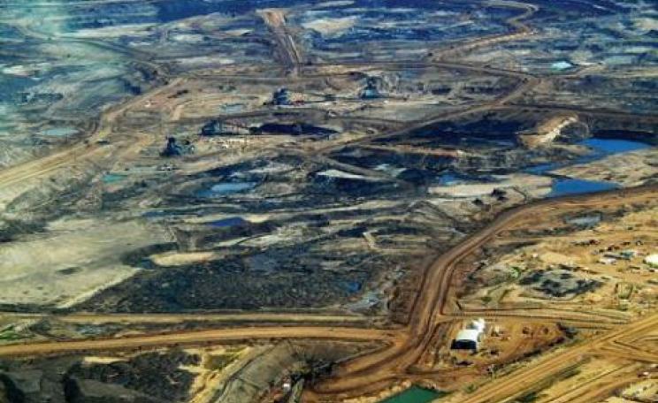 Heavy oil undergoing extraction from tar sands, Alberta. Canada. Photo: Howl Arts Collective via Flickr.