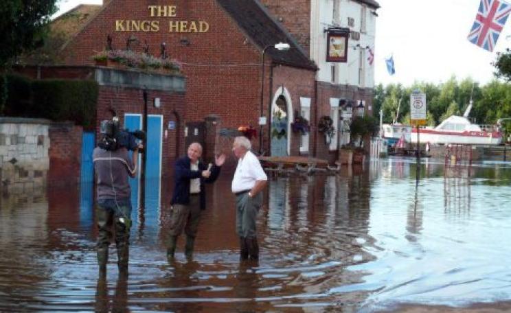 ITV interviews a victim of the flooded Severn in 2007. Photo: Wikimedia Commons via Open Democracy.