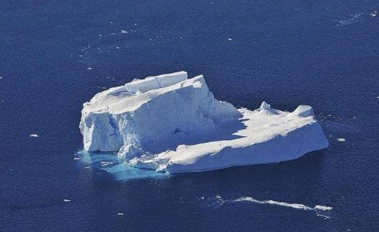 An iceberg floating in the Amundsen Sea, where glaciers are shedding ice faster than in any other part of Antarctica. Photo: NASA / Jane Peterson via Wikimedia Commons.