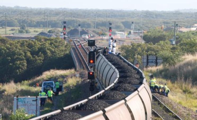 Protestors halt the first test train load of coal coming from the controversial Maules Creek coal mine on its way to Newcastle’s Kooragang Island coal export terminals. Photo: Frontline Action on Coal.