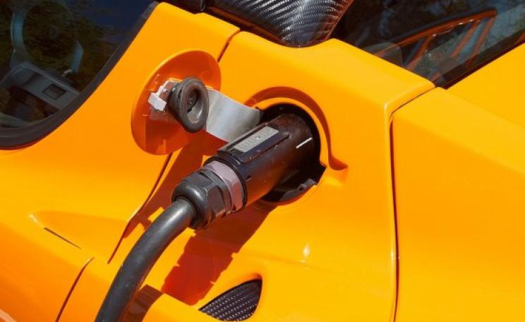 Look - no gasoline! A Tesla Roadster charging up outside the company's Palo Alto HQ, California. Photo: Windell Oskay via Flickr (CC BY 2.0).