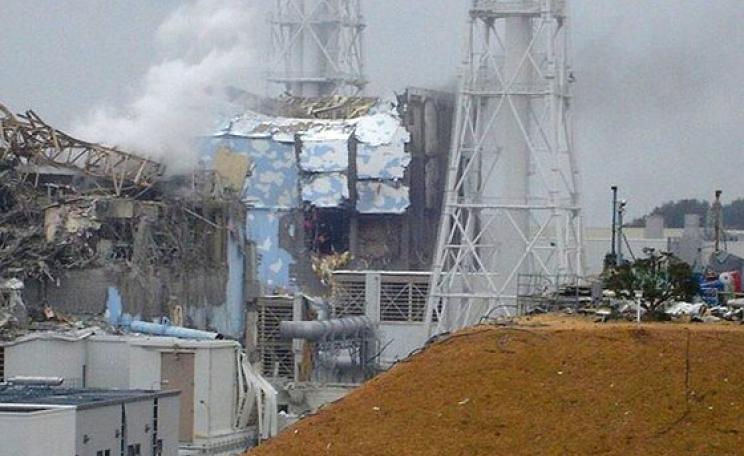 Fukushima damage showing Unit 3, left, and Unit 4, right, 16th March 2011. Photo: deedavee easyflow via Flickr (CC BY-SA 2.0).