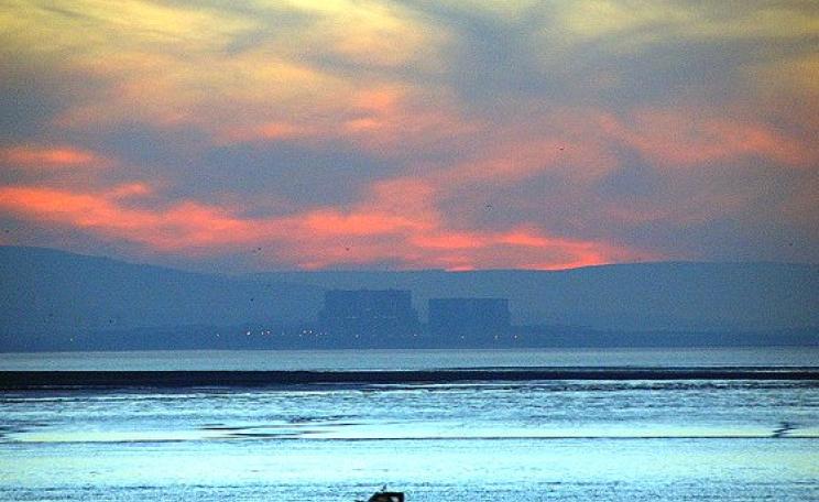 Sunset over Hinkley Point. Photo: Joe Dunckley via Flickr (CC BY-NC-SA 2.0).