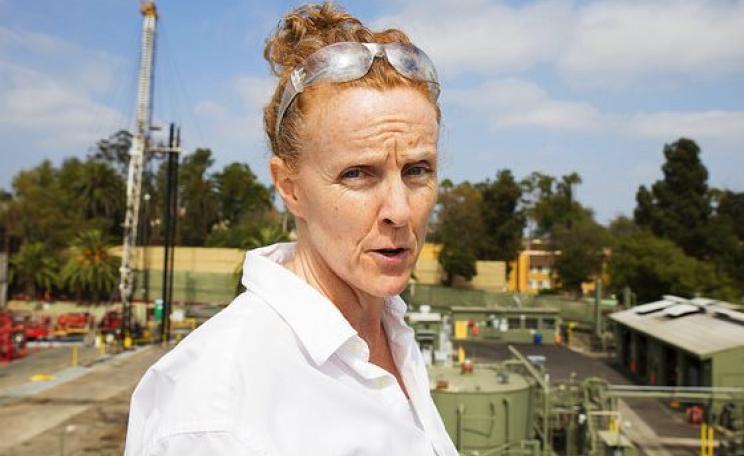 Donna Ann Ward, co-founder of CoWatchingOil LA, overlooks the Murphy Oil fracking site in residential Los Angeles. She and many other Angelinos believe that fracking wells in the city are responsible for severe public health impacts. Photo: Sarah Craig /