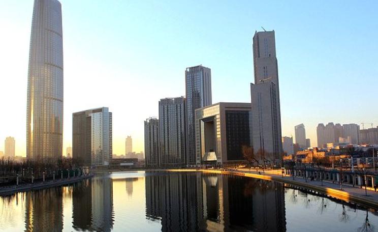 The dazzling pace of development in China comes at a human cost - of those dispossessed to make way for it all. Tianmu is one of the villages in the way of the expansion of Tianjin, pictured. Photo: Yang Aijun / World Bank via Flickr (CC-BY-NC-ND).