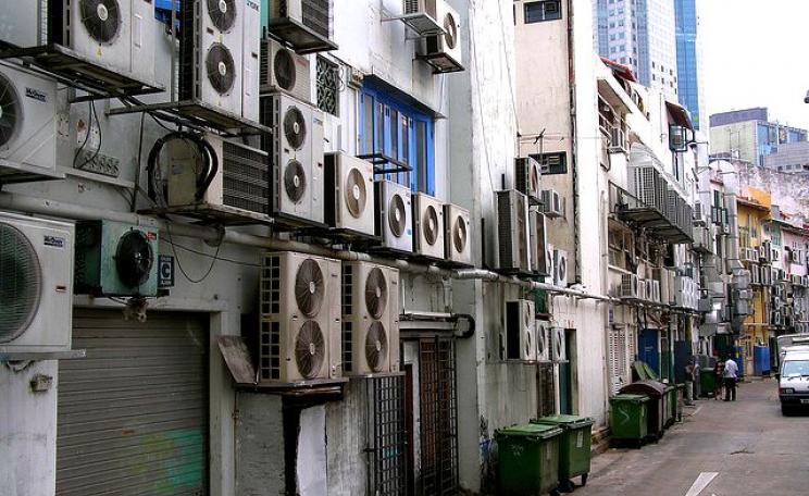 HFCs are widely used in air-con systems like these in a Singapore back alley. Photo: Magalie L'Abbé via Flickr (CC BY-NC).