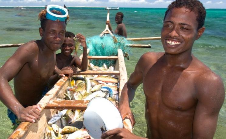 Young fishers with their catch on the opening day after a temporary fisheries closure. Small-scale fisheries support the livelihoods of at least 500 million people worldwide - Andavadoaka, Madagascar. Photo: Garth Cripps / Blue Ventures.
