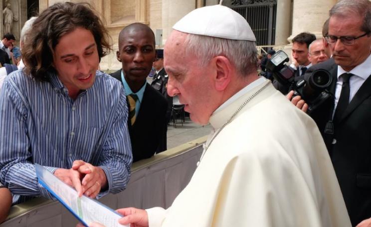 Pope Francis reads the Catholic Climate Petition with GCCM representatives Tomás Insua from Argentina and Allen Ottaro from Kenya. Photo: Fotografia Felici.
