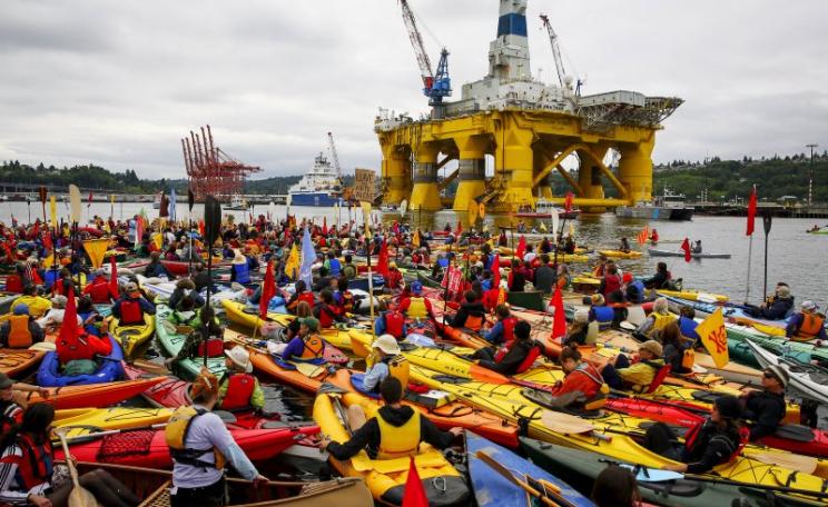 These guys aren't waiting till 2050! 'Kayaktivists' opposing Shell's plans to drill for oil in the Arctic Ocean prepare for the 'Paddle in Seattle' protest, 16th May 2015. Photo: Backbone Campaign via Flickr (CC BY).