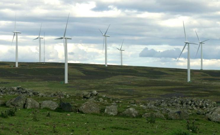 The answer, my friend, is blowing in the wind. Cairn Gleamnach in the foreground, Drumderg wind farm behind. Photo: Stuart Anthony via Flickr (CC BY-NC-ND).