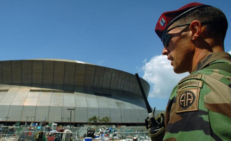On patrol outside the Superdome in New Orleans, Louisiana (LA), during Hurricane Katrina relief Operations. Photo: Expert Infantry via Flickr (CC BY).