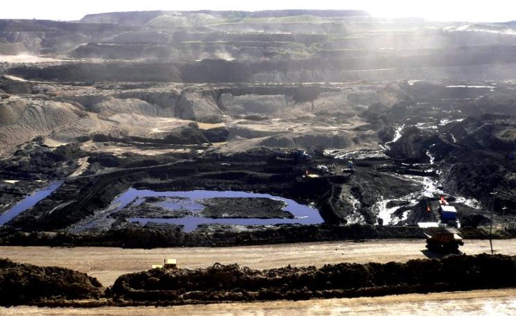 Is this what you want your pension fund to finance? Open pit coal mine near Hailar, Inner Mongolia. Photo: Herry Lawford via Flickr (CC BY).
