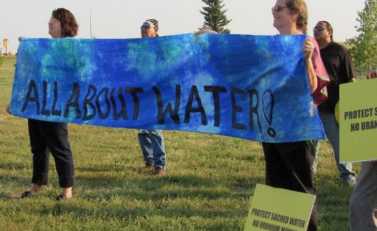 Colleen Brennan and Nancy Kile of the Sisterhood to Protect Sacred Water rally outside the Nuclear Regulatory Hearings in Crawford. Photo: Rosy Torres / WNV (CC BY).