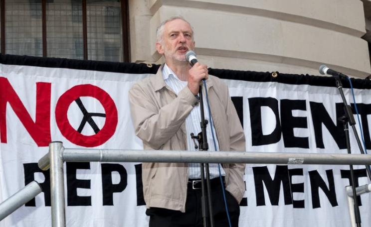 Jeremy Corbyn addresses the crowd at the 'Vote Out Trident' CND protest outside the Ministry of Defence,  London, 13 April 2015. Photo: RonF / The Weekly Bull via Flickr (CC BY-NC-ND).