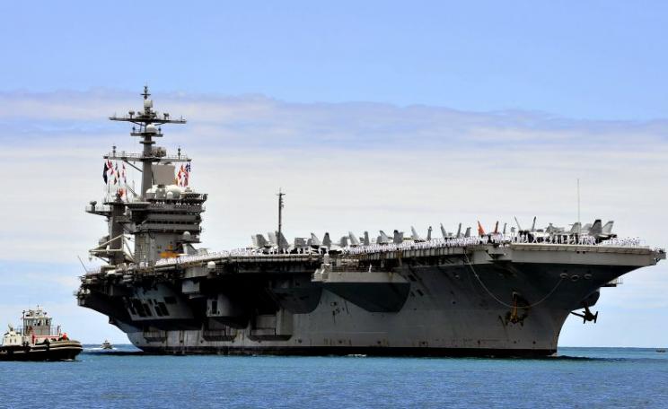 US Pacific Fleet aircraft carrier USS Carl Vinson arrives at Joint Base Pearl Harbor-Hickam for a port visit while in transit to its homeport of San Diego. US Navy photo by Mass Communication Specialist 2nd Class Jeff Troutman via Flickr (CC BY-NC).