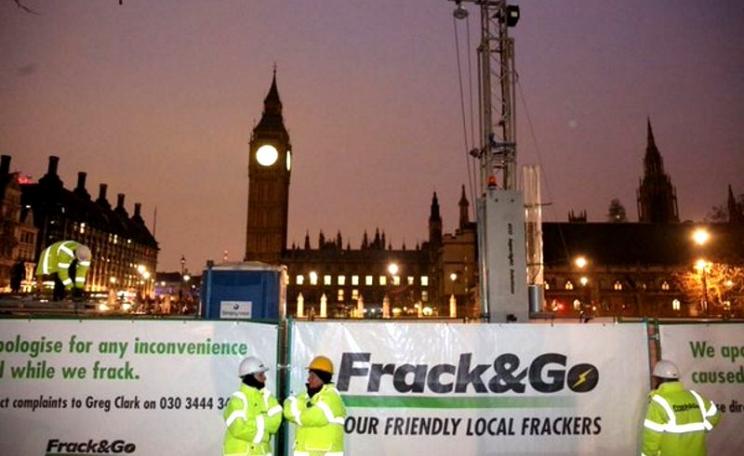 Greenpeace erecting their fracking rig in Parliament Square, London early this morning. Photo: Greenpeace.