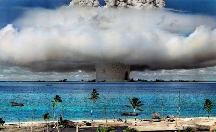 A US nuclear weapon is detonated at Bikini Atoll in the Marshall Islands in 1946. (Image has been colorized.) Photo: US Government via International Campaign to Abolish Nuclear Weapons on Flickr (Public Domain).