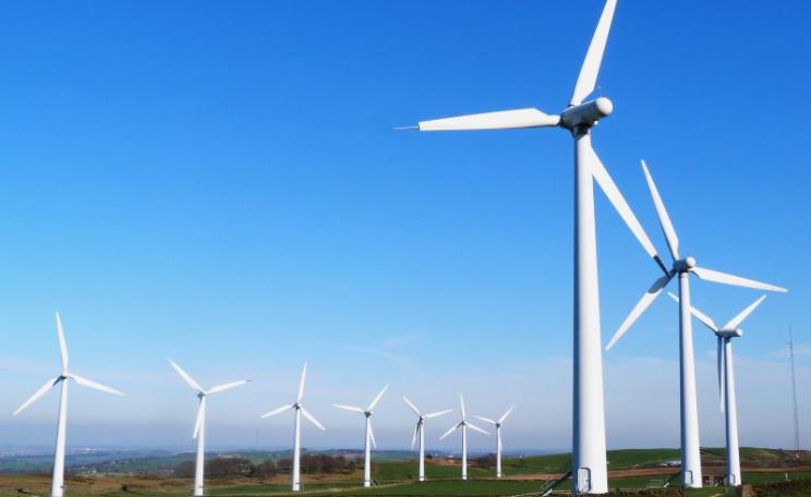 The key to further big increases in wind and solar capacity is to store surplus power as gas, then burn it CCGT gas power stations when needed to meet demand. Photo: Royd Moor wind farm, Yorkshire, by steve p2008 via Flickr (CC BY).