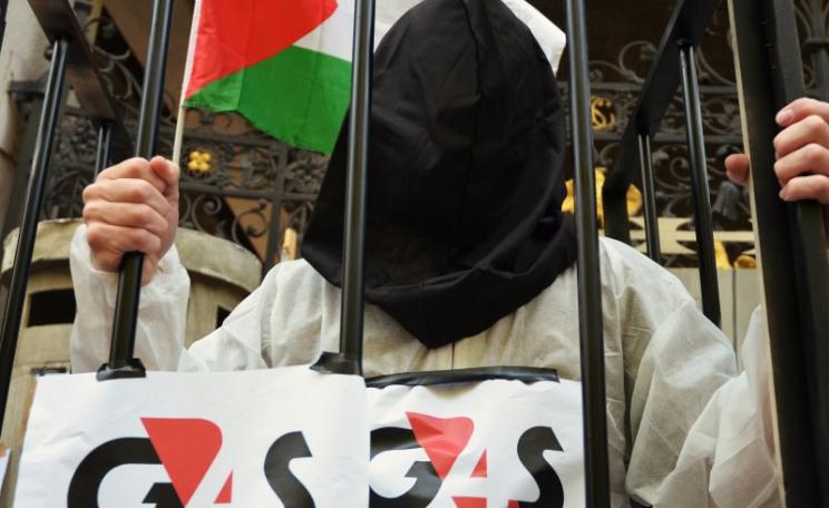 G4S provides security systems for prisons which hold Palestinian political prisoners from occupied Palestinian territory inside Israel, in contravention of Article 76 of the Fourth Geneva Convention. Photo: Anti-G4S demo in London, June 2016 by Darren Joh