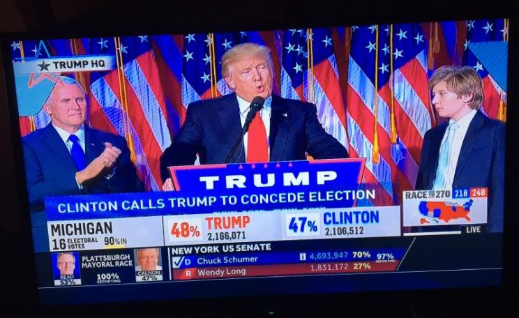 Trump delivers his victory speech, calling for all Americans to unite as one people. Photo of NBC live coverage by T D Cabot.