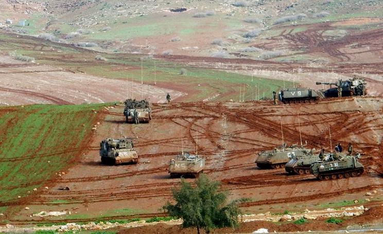 Military tanks in fields cultivated by a-Ras al-Ahmar community, partially seen in the top-left corner. Photo: 'Aref Daraghmeh, B'Tselem, 27 Jan. 2016.