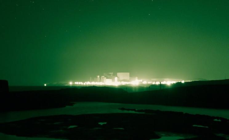 False promise ... Wylfa 2 nuclear power station glowing in the dark on Anglesey, Wales. Photo: Adrian Kingsley-Hughes via Flickr (CC BY-NC-ND).