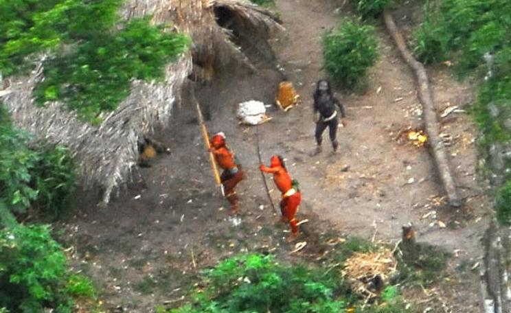 Seen here in 2008, this uncontacted indigenous community in Brazil's Amazon may be fierce in defence of its lands. But they don't stand a chance in the face of bulldozers, chainsaws, automatic weapons, and the new diseases brought by loggers, miners and f