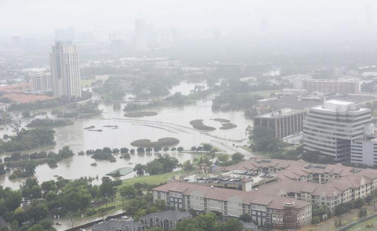 A Coast Guard MH-60 Jayhawk helicopter crew from Air Station Houston conducts an overflight of a southeastern Houston neighborhood on 27 August 2017. (c) U.S. Coast Guard photo by Petty Officer 3rd Class Corinne Zilnicki.