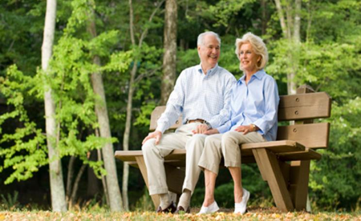An old couple on a park bench