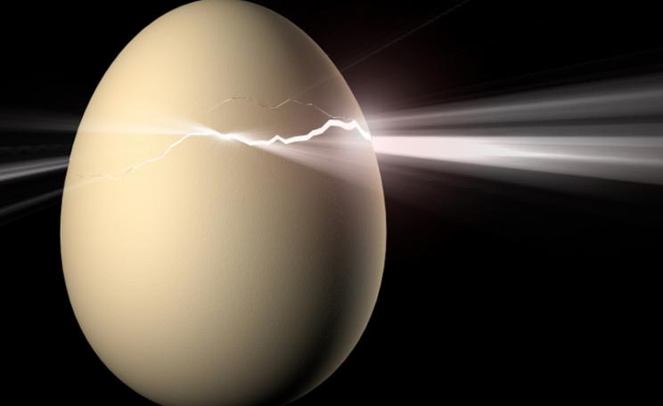 Image of an egg cracking representing symbolic change