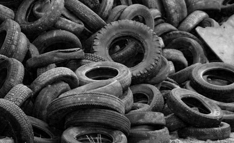 A pile of used car tyres