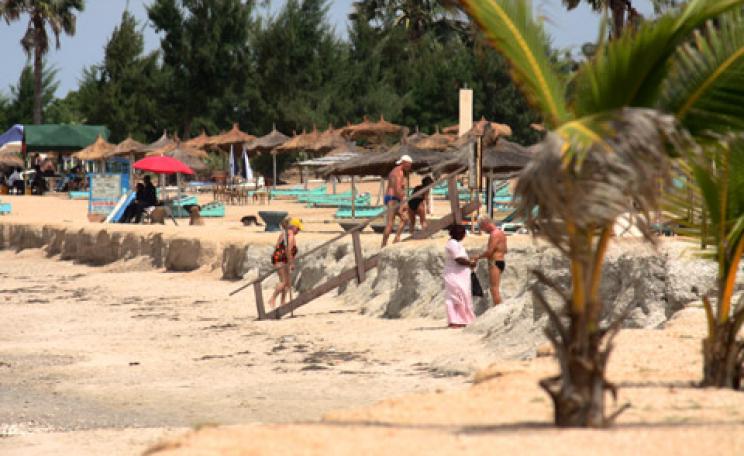 Tourists on beach in Gambia